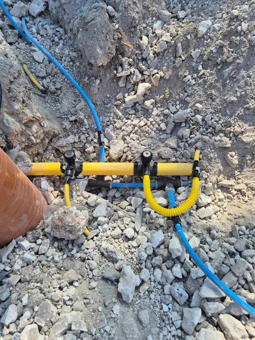 Multi-utility service connection — water, gas and cable